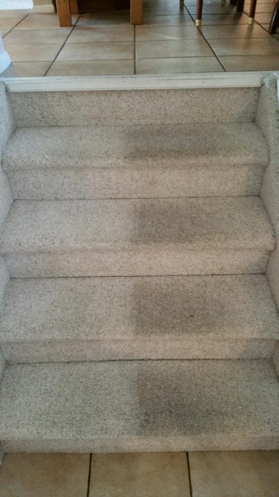 half clean, half dirty stairs in residential home