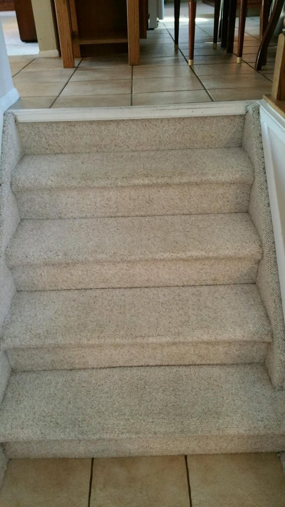 cream colored stairs after being fully cleaned in a residential home
